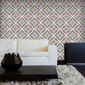 Living room with patterned wallpaper, white sofa, and black coffee table.