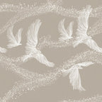 Decorative pattern of white birds and branches on a beige background
