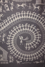 Textile with intricate white pattern on a dark background