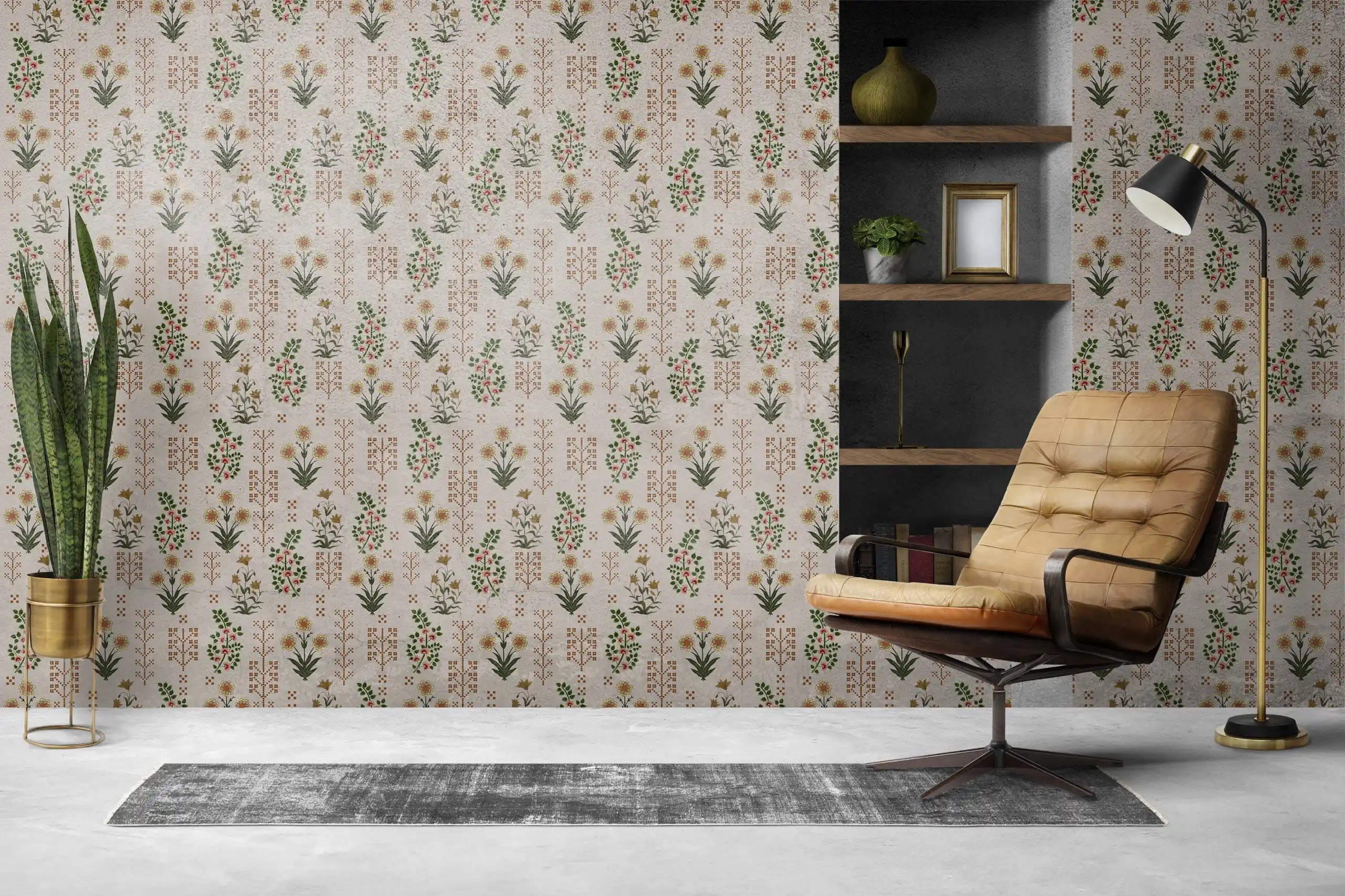 Room interior with a brown leather chair, bookshelf, and decorative plants against a floral wallpaper.