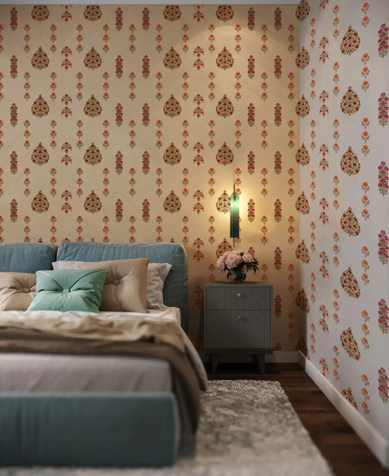 Bedroom with floral wallpaper, blue bed, and nightstand with lamp.