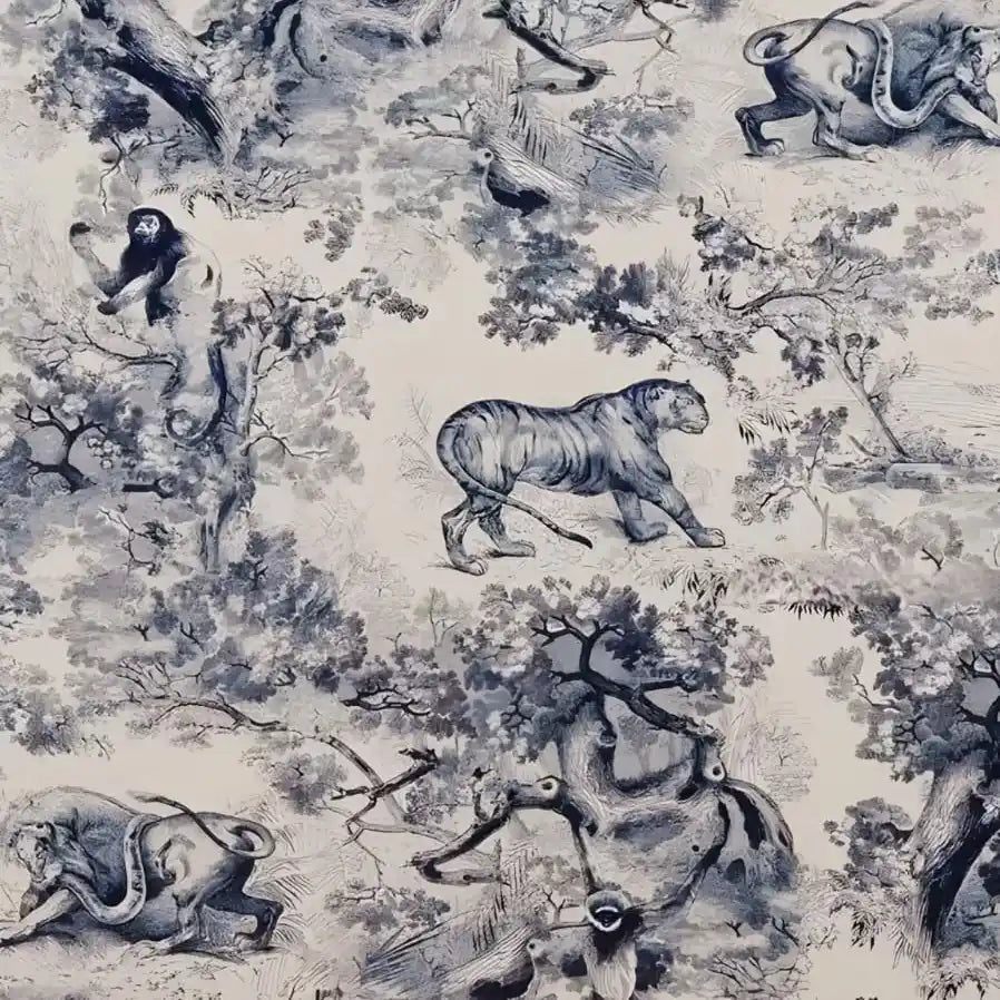 Patterned fabric with black and white animals and trees on a light background