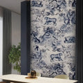 Wallpaper with animal pattern in a room with a table and plant.