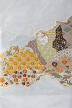Decorative paper with floral and geometric patterns on a white background