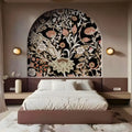 Decorative wall art with floral design above a bed in a bedroom setting.