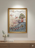Framed artwork depicting a scenic landscape on a wall above a wooden console table.