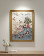 Framed artwork depicting a scenic landscape on a wall above a wooden console table.