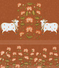 Decorative design with two cows and floral patterns on a brown background