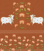 Decorative design with two cows and floral patterns on a brown background