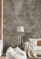 Living room with patterned wallpaper, bean bag chair, and lamp.