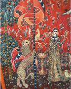 Decorative panel with intricate designs of animals and a woman in a gown on a red background.