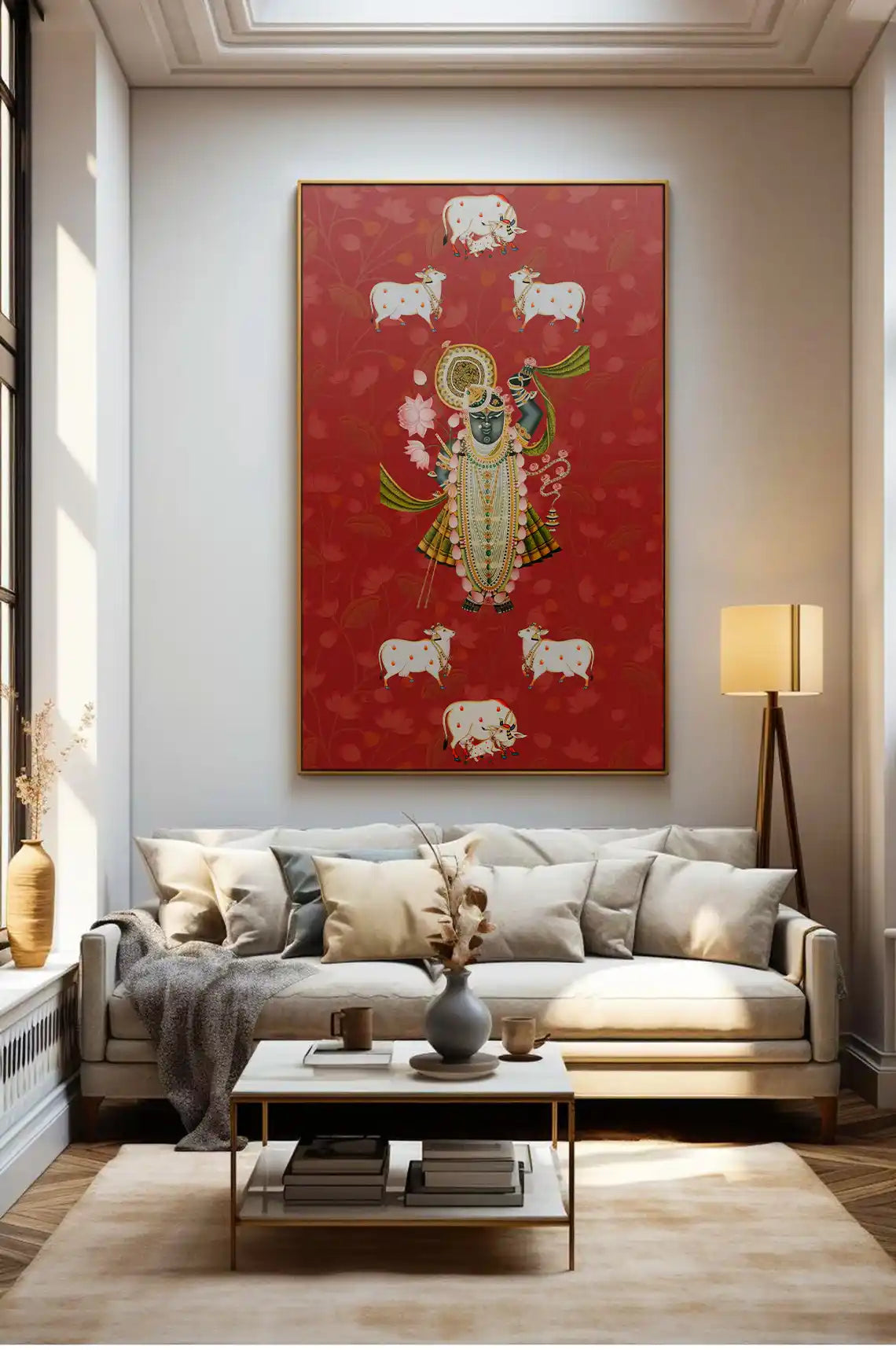 Living room with a red painting of a religious figure and sheep on the wall.