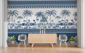 Room interior with a decorative wall mural featuring palm trees and geometric patterns.
