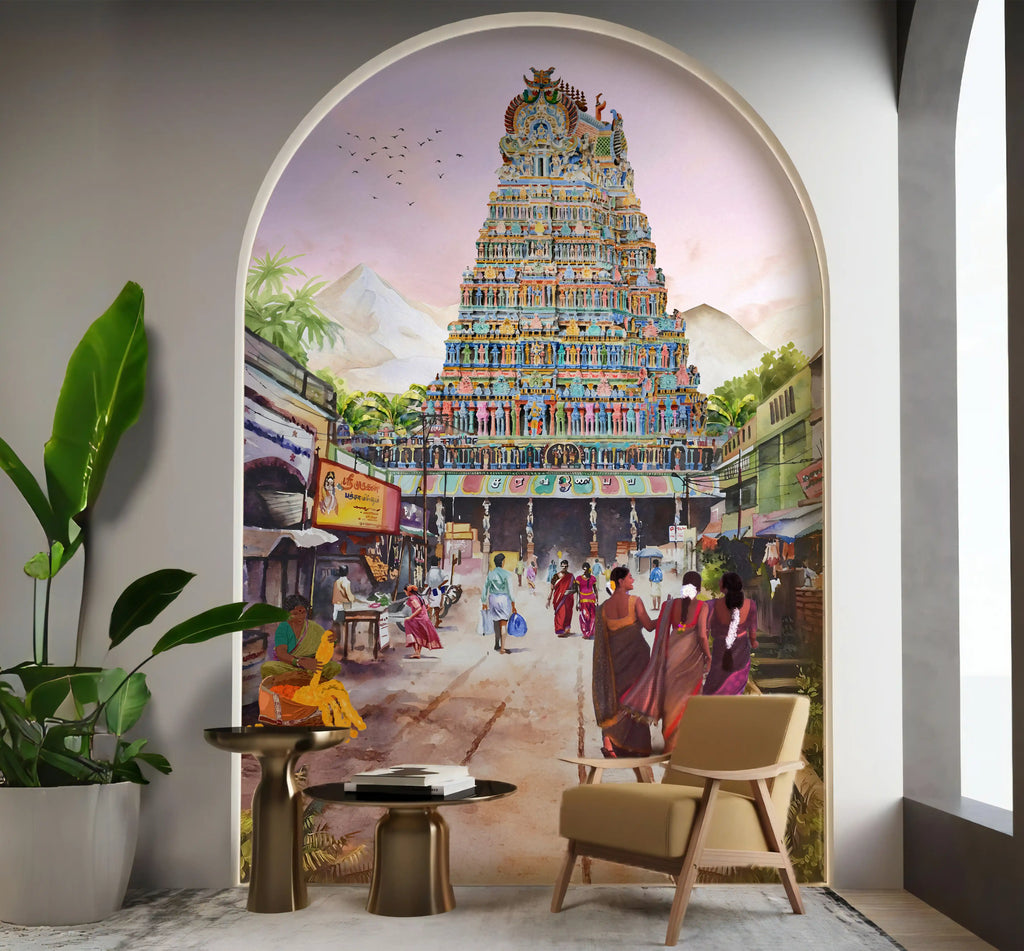 Decorative wall mural of a colorful temple with people in a street scene, featuring a chair and plant in a room.