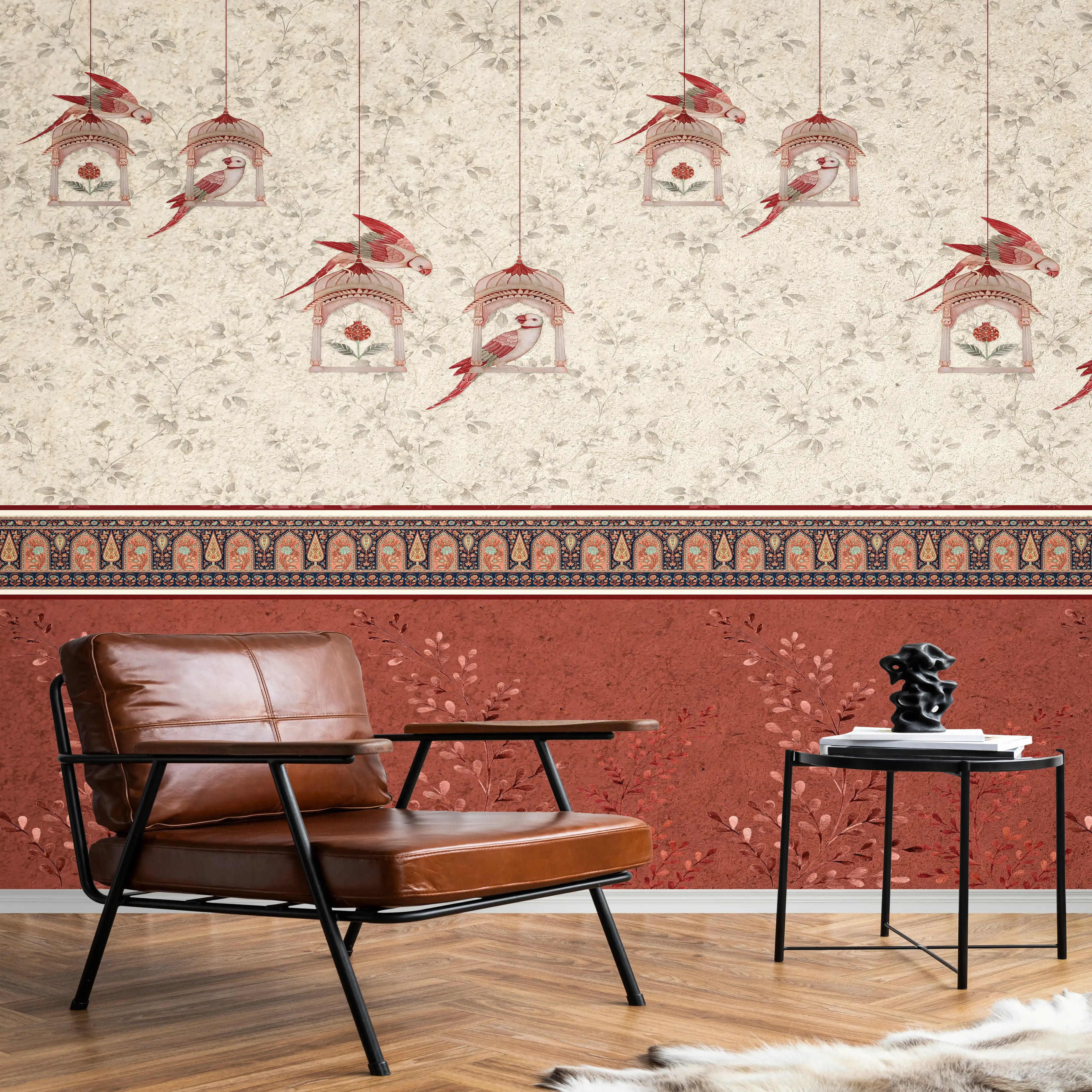 Brown leather chair in a room with decorative wallpaper featuring birdcages.