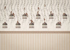Decorative wallpaper with hanging bird and flower design on a beige background