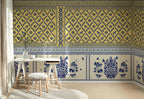Room interior with decorative blue and yellow patterned wallpaper.