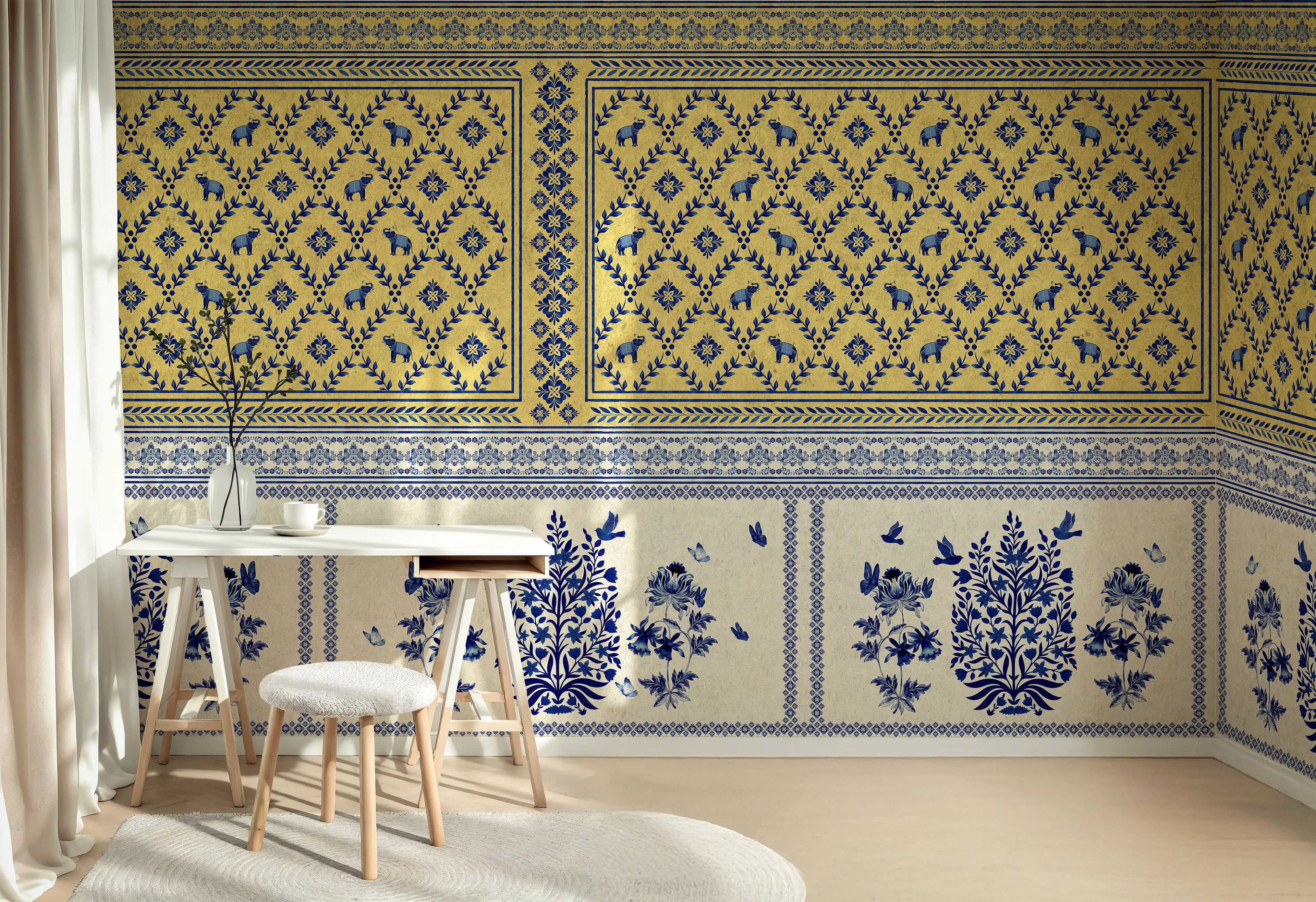 Room interior with decorative blue and yellow patterned wallpaper.