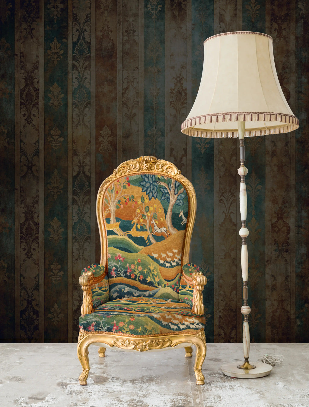 Decorative armchair with intricate patterns and gold accents next to a tall floor lamp against a patterned wall.